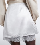 Acne Studios Layered lace-trimmed satin miniskirt