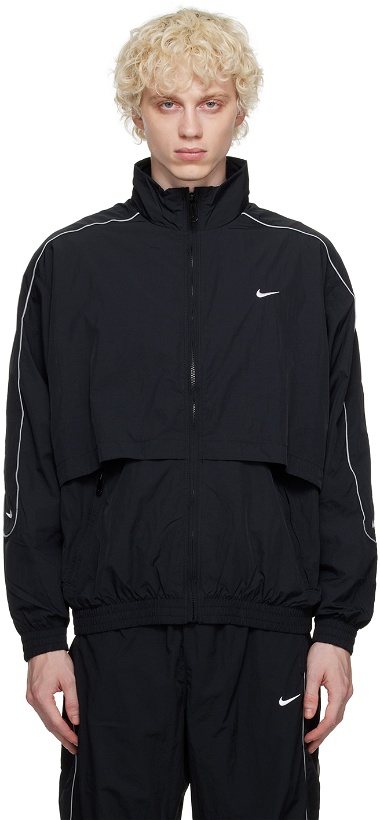 Photo: Nike Black Sportswear Solo Swoosh Track Jacket