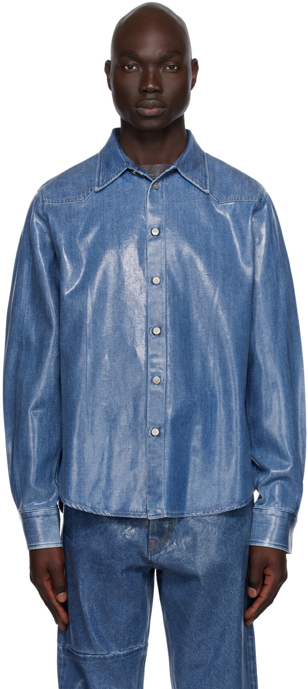 https://cdn.clothbase.com/uploads/978bcacc-0562-496b-808f-590ef28ccafd/blue-coated-denim-shirt.jpg