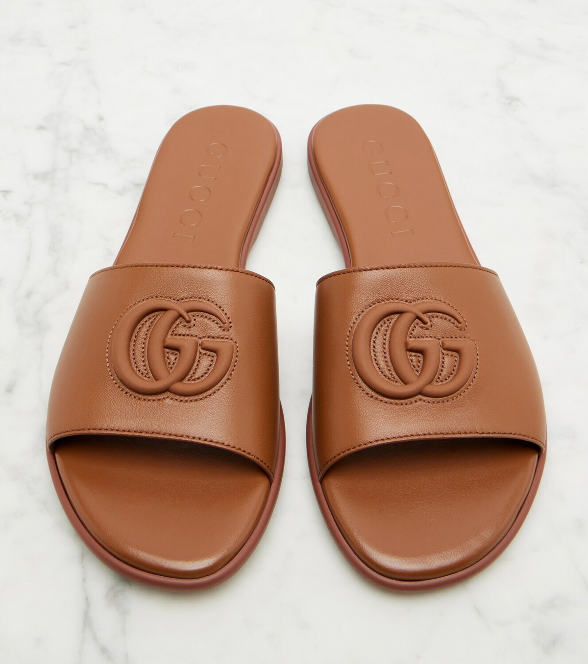 Gucci Double G leather slides
