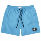 Calvin Klein Men's Monogram Logo Nylon Swim Shorts in Blue