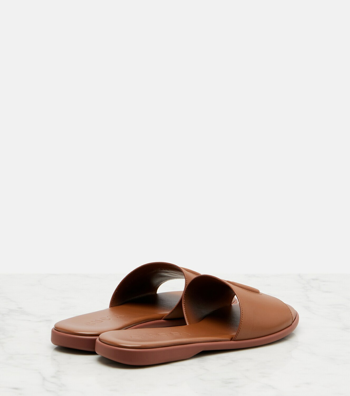 Gucci Double G leather slides