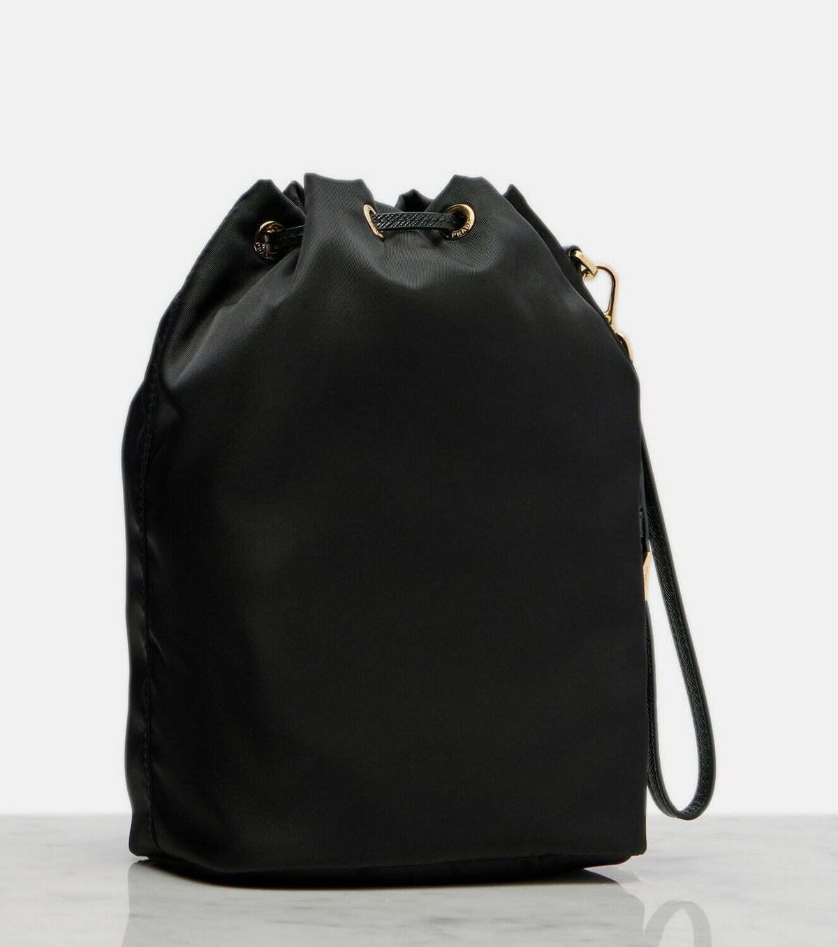 Prada Re-Nylon leather-trimmed bucket bag