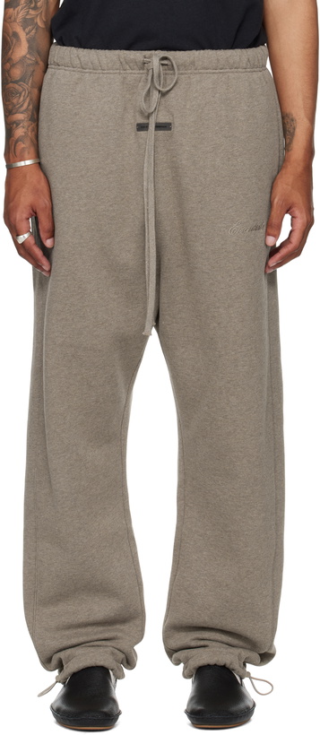 Photo: Fear of God ESSENTIALS Brown Relaxed Fleece Piping Sweatpants