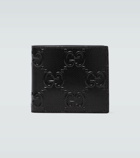 Gucci - Embossed GG leather wallet