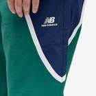 New Balance Men's Hoops Woven Pant in Team Forest Green