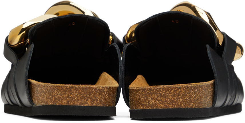 Buffed calfskin slip-on loafers in black. Signature curb chain accent at vamp. JW Anderson Black Chain Loafers JW Anderson main image 2