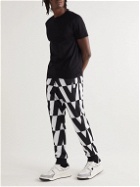 Valentino - Tapered Logo-Print Jersey Sweatpants - Black