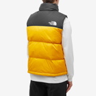 The North Face Men's 1996 Retro Nuptse Vest in Summit Gold/Tnf Black