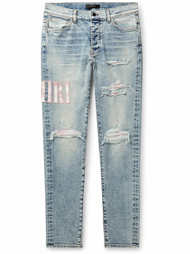 Photo: AMIRI - Skinny-Fit Logo-Appliquéd Distressed Jeans - Blue