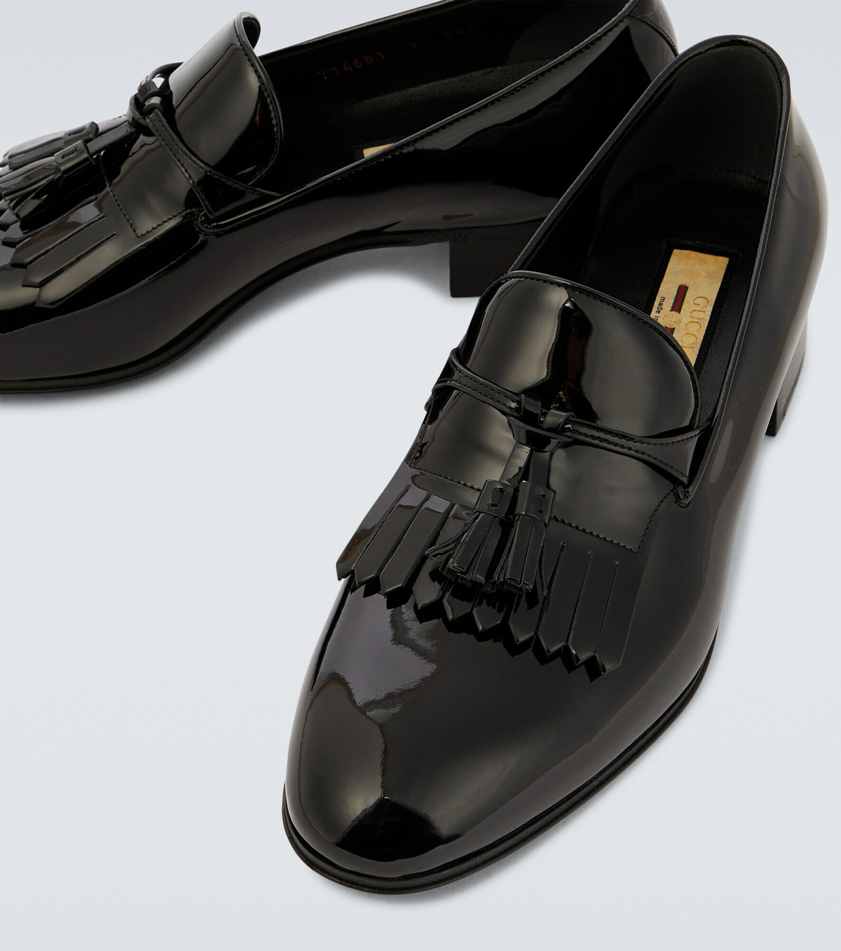 Gucci - Tasseled patent leather loafers