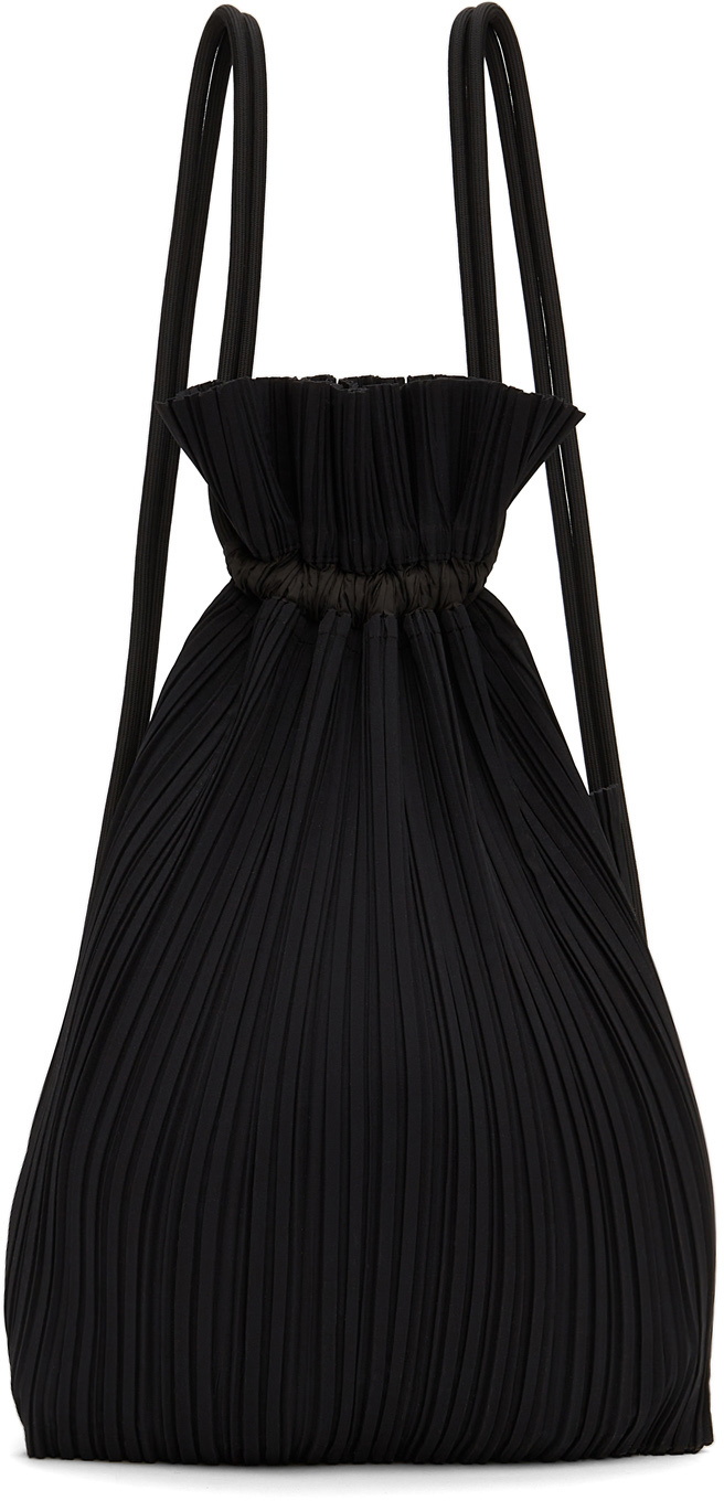 Pleats Please Issey Miyake black drawstring shoulder bag - Realry: A global  fashion sites aggregator