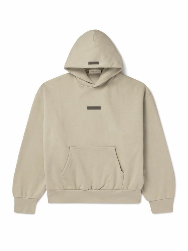 Photo: FEAR OF GOD ESSENTIALS - Oversized Logo-Appliquéd Cotton-Blend Jersey Hoodie - Neutrals