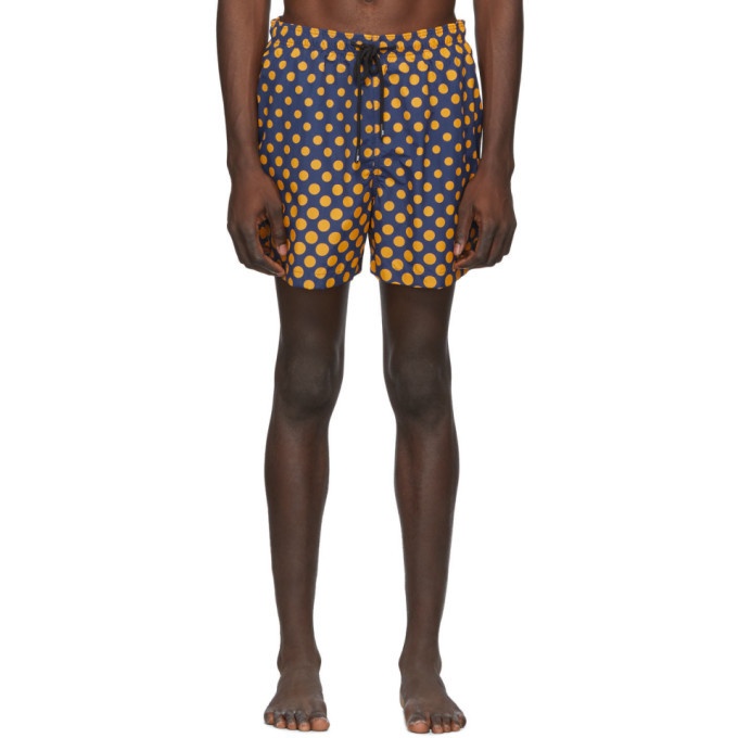 Photo: Solid and Striped Navy and Orange Ombre Dot The Classic Swim Shorts