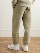 AMI PARIS - Tapered Logo-Embossed Cotton-Blend Sweatpants - Green