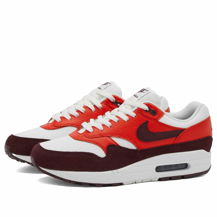 Photo: Nike Men's Air Max 1 Sneakers in Summite White/Burgundy/Red