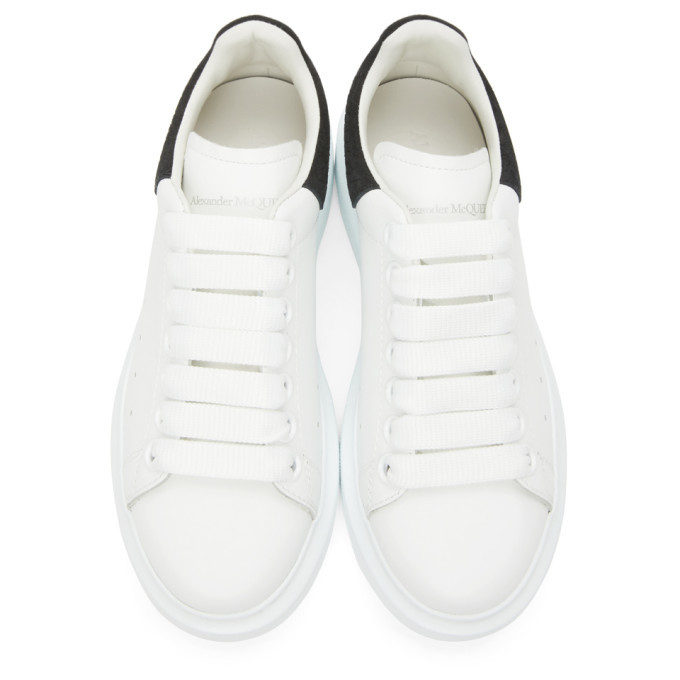 Alexander mcqueen black snake best sale oversized sneakers