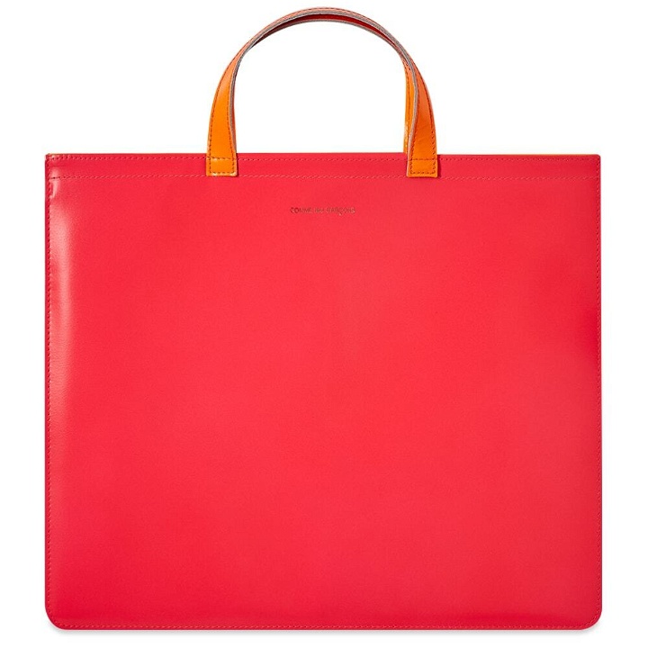 Photo: Comme des Garçons Super Fluro Leather Tote Bag in Pink/Yellow