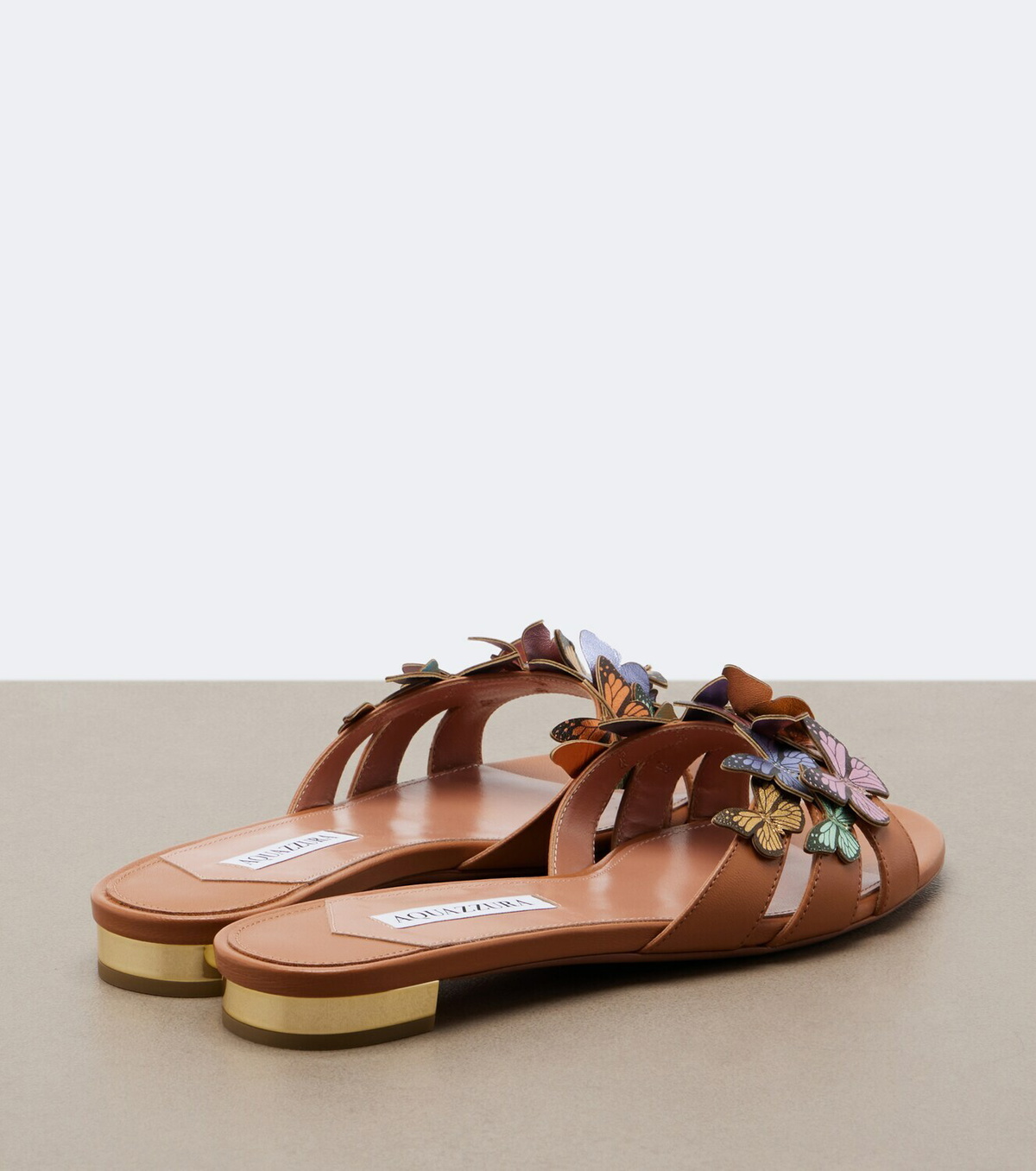 Aquazzura Papillon appliqué leather slides