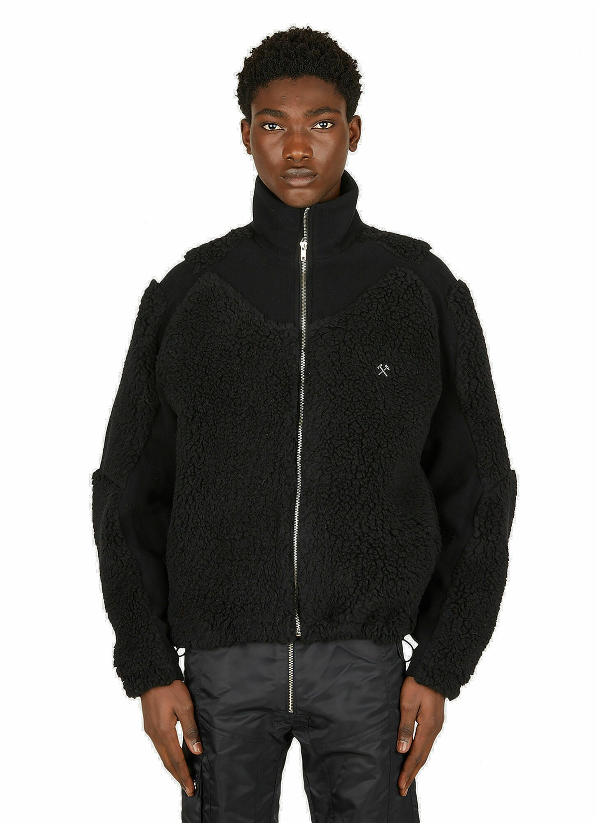 Photo: Panelled Fleece Jacket in Black