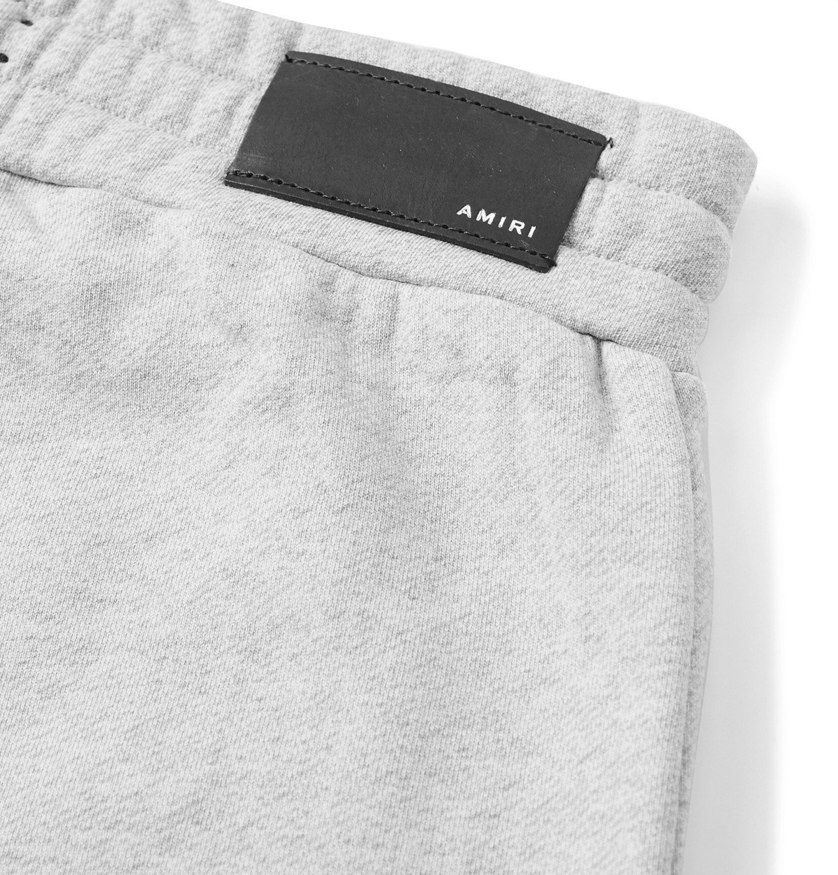 AMIRI - Tapered Logo-Print Mélange Loopback Cotton-Jersey Sweatpants - Gray  Amiri