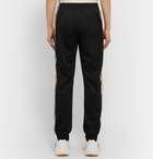 Gucci - Tapered Logo-Jacquard Webbing-Trimmed Tech-Jersey Track Pants - Black