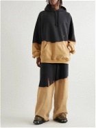 VETEMENTS - Wide-Leg Logo-Embroidered Bleached Cotton-Blend Jersey Sweatpants - Black