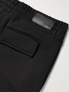 AMIRI - Slim-Fit Tapered Loopback Cotton-Jersey Cargo Sweatpants - Black