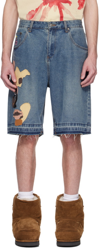 Photo: KidSuper Blue Face Patchwork Baggy Denim Short
