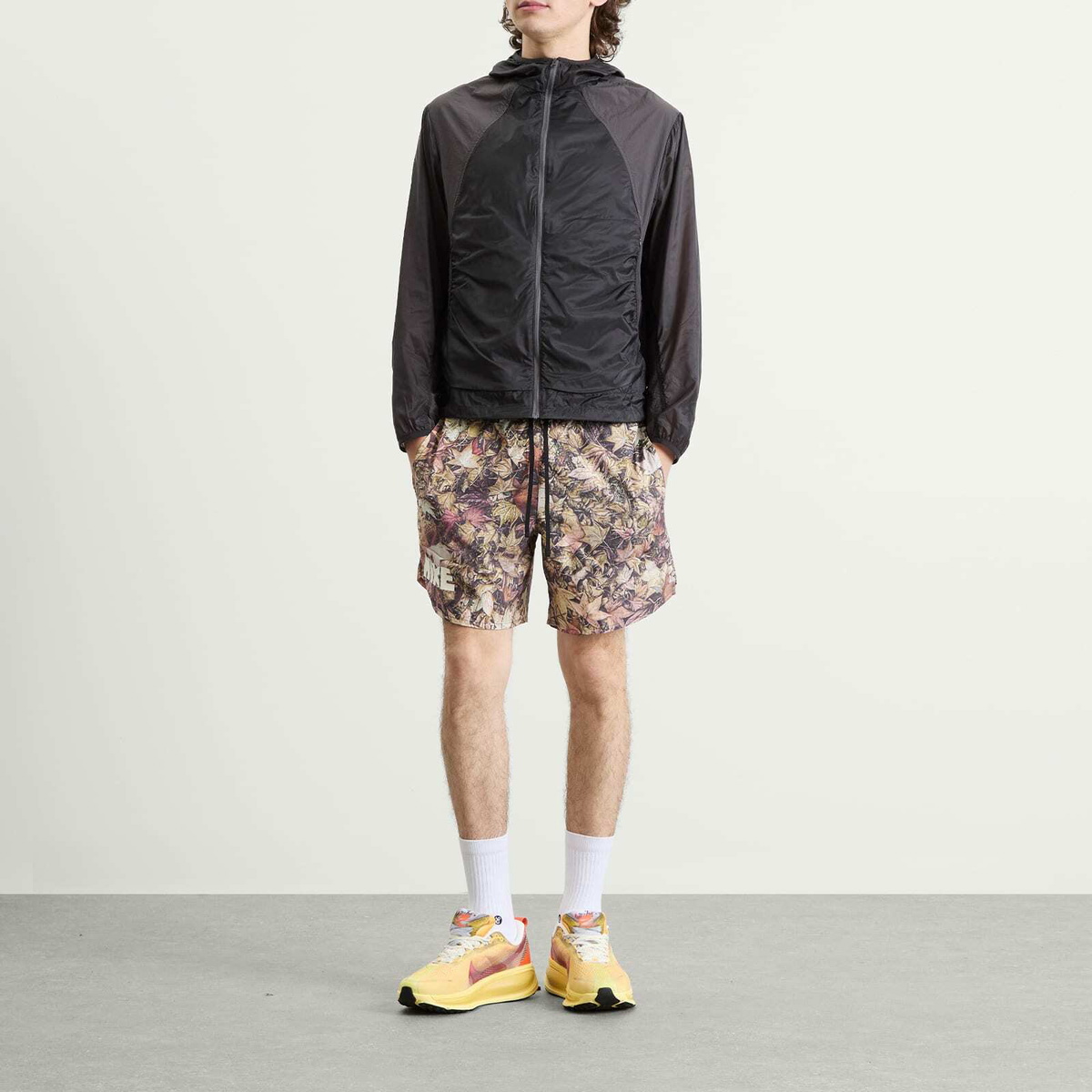 Nike Running Men's Stride 7-Inch Short in Black/White/Hemp