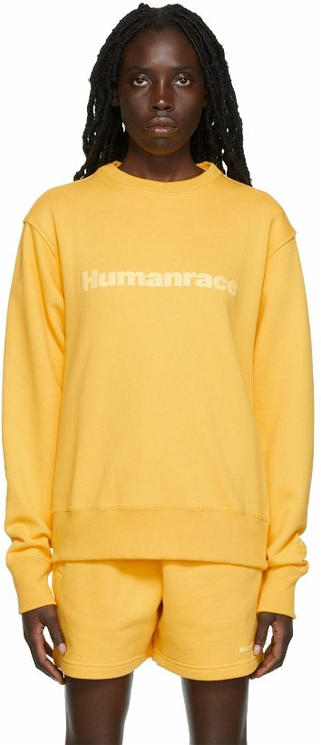Photo: adidas x Humanrace by Pharrell Williams Yellow Humanrace Basics Sweatshirt