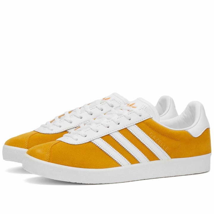Photo: Adidas Gazelle 85 Sneakers in Preloved Yellow/White/Gold Met.