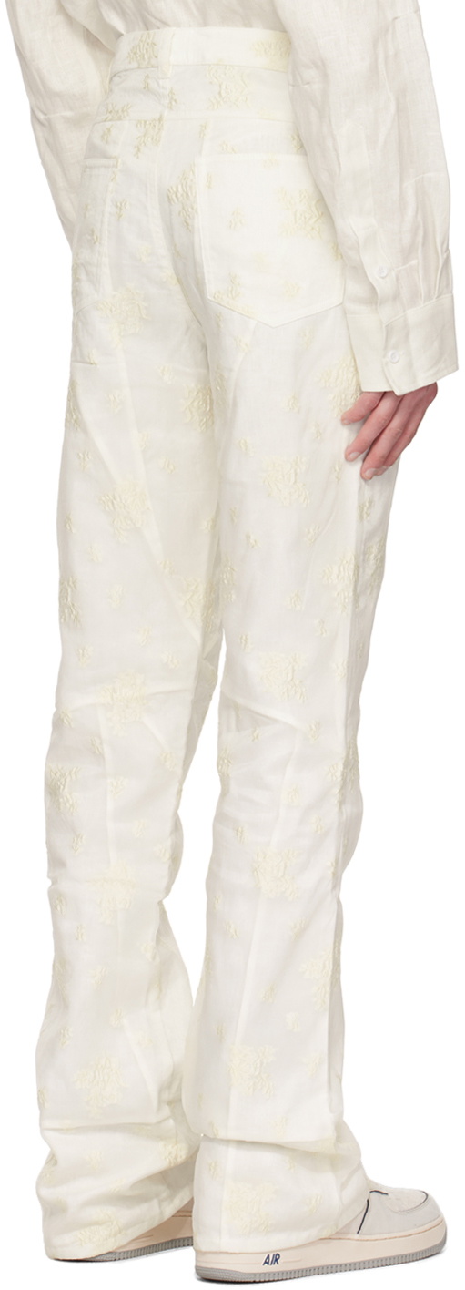 Who Decides War by MRDR BRVDO White Embroidered Trousers