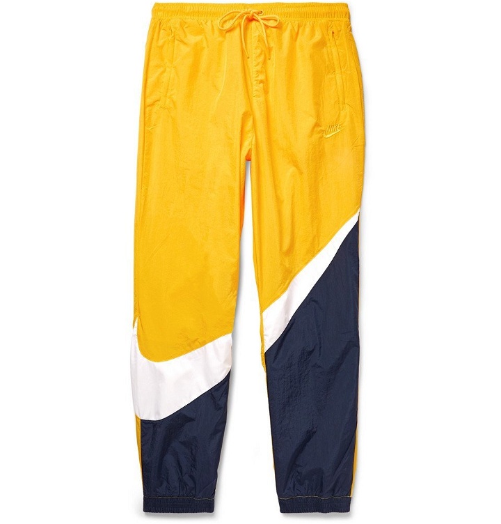 Photo: Nike - Tapered Logo-Print Colour-Block Nylon Track Pants - Men - Yellow