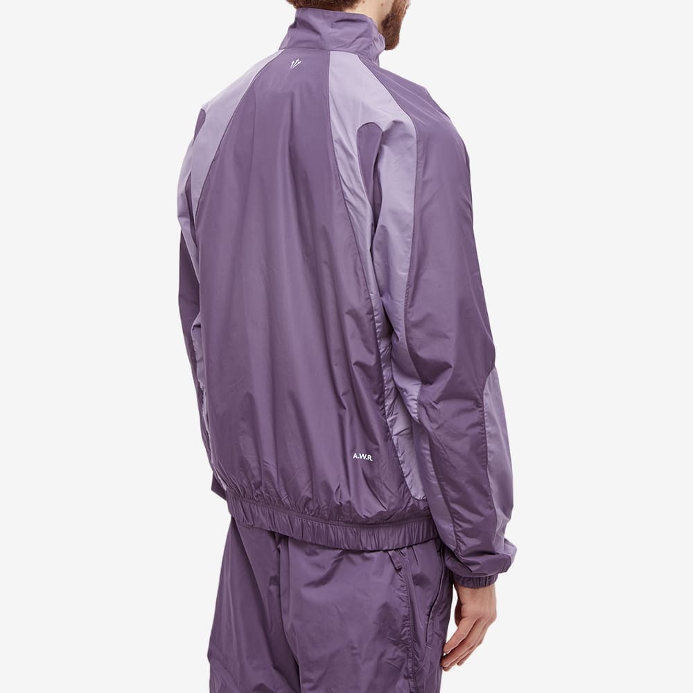 Nike Men's Nocta Track Jacket in Dark Raisin/Daybreak/Cobalt Nike Men's Nocta Track Jacket in Dark Raisin/Daybreak/Cobalt