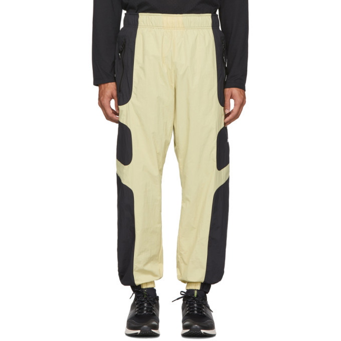 Photo: Nike Beige and Black NSW Re-Issue Track Pants