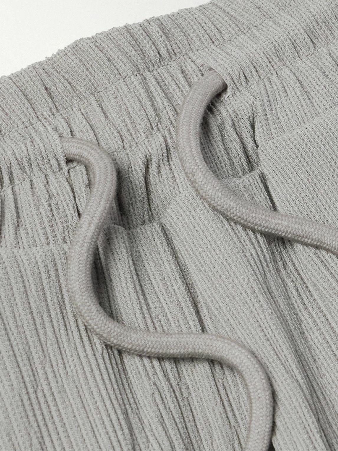The Frankie Shop - Eliott Tapered Pleated Textured Stretch-Jersey Drawstring Trousers - Gray