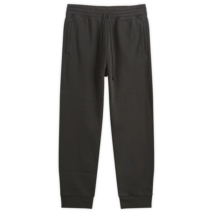 Photo: SKIMS Men's Tapered Jogger in Washed Onyx