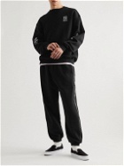 Adish - Tapered Logo-Embroidered Cotton-Jersey Sweatpants - Black