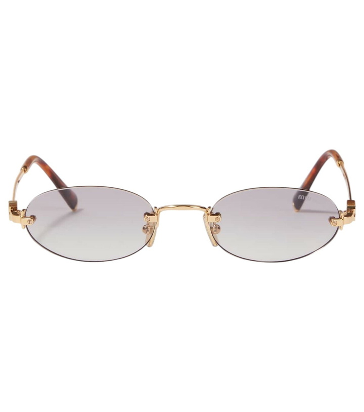 Photo: Miu Miu Oval sunglasses