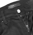 AMIRI - Skinny-Fit Distressed Waxed Stretch-Denim Jeans - Men - Black