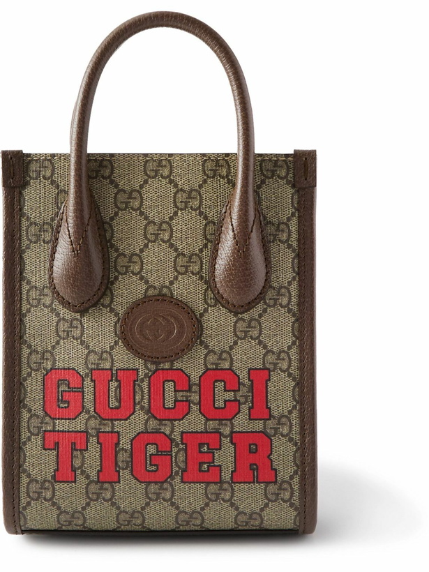 Photo: GUCCI - GG Supreme Mini Leather-Trimmed Monogrammed Coated-Canvas Tote Bag