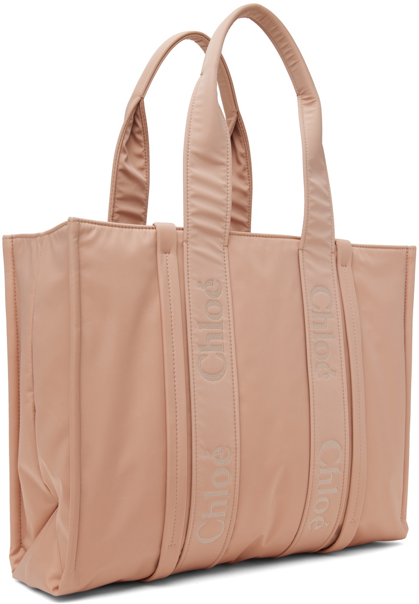 トートバッグ CHLOE\tSMALL WOODY TOTE BAG\tCHC22AS397I26\t6J5\t\tCEMENT PINK Chloé Small Woody Tote Bag In Linen in Cement pink | Chloé US