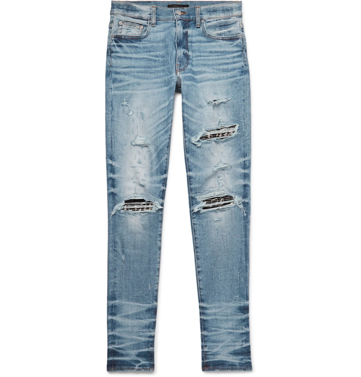 Photo: AMIRI - Skinny-Fit Embellished Twill-Panelled Distressed Stretch-Denim Jeans - Blue