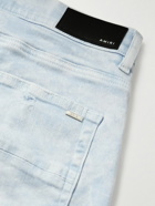 AMIRI - MX1 Skinny-Fit Distressed Leather-Panelled Jeans - Blue