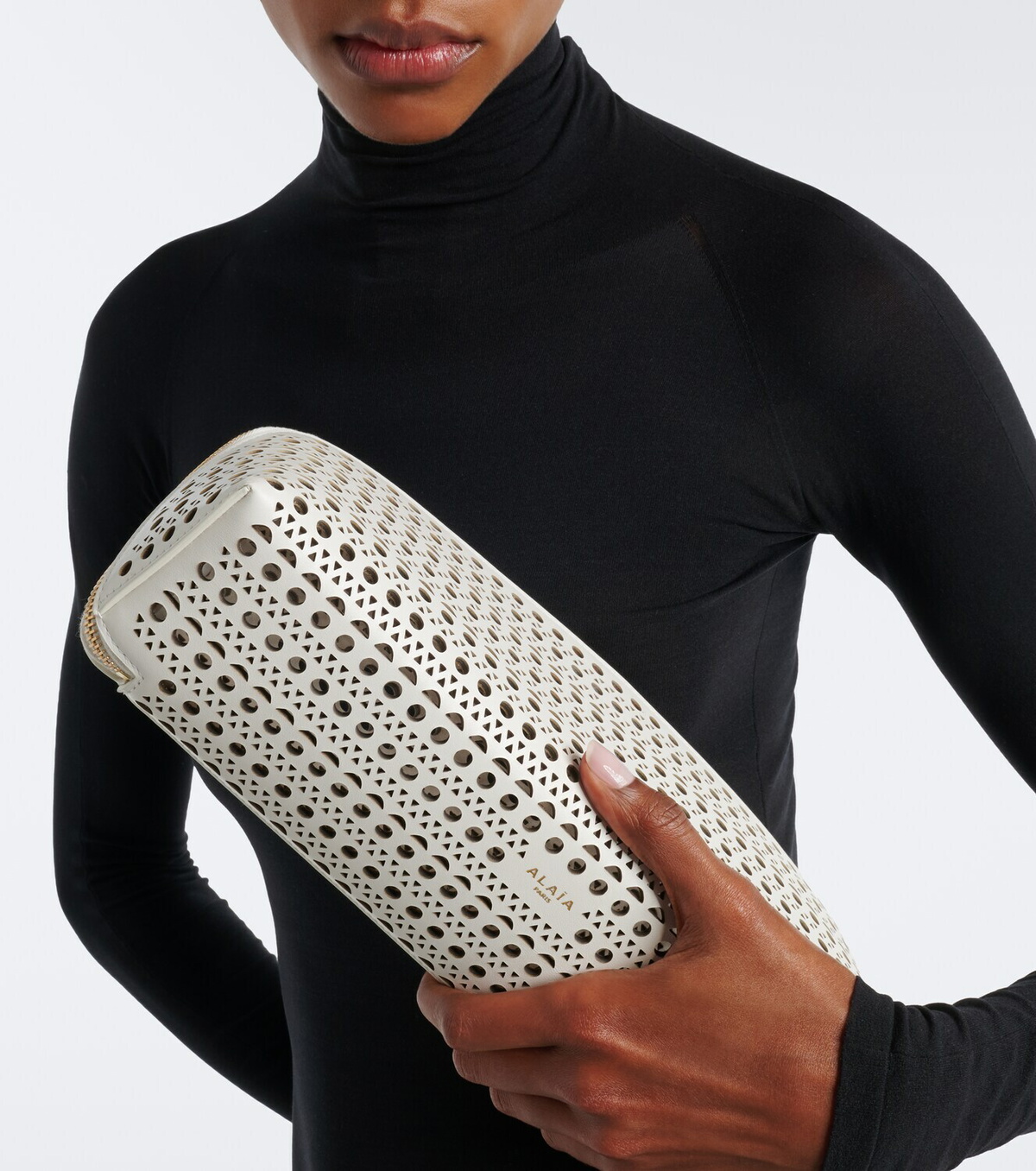 Alaïa Delta Small leather clutch