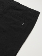 FOLK - Assembly Tapered Pleated Cotton-Ripstop Trousers - Black