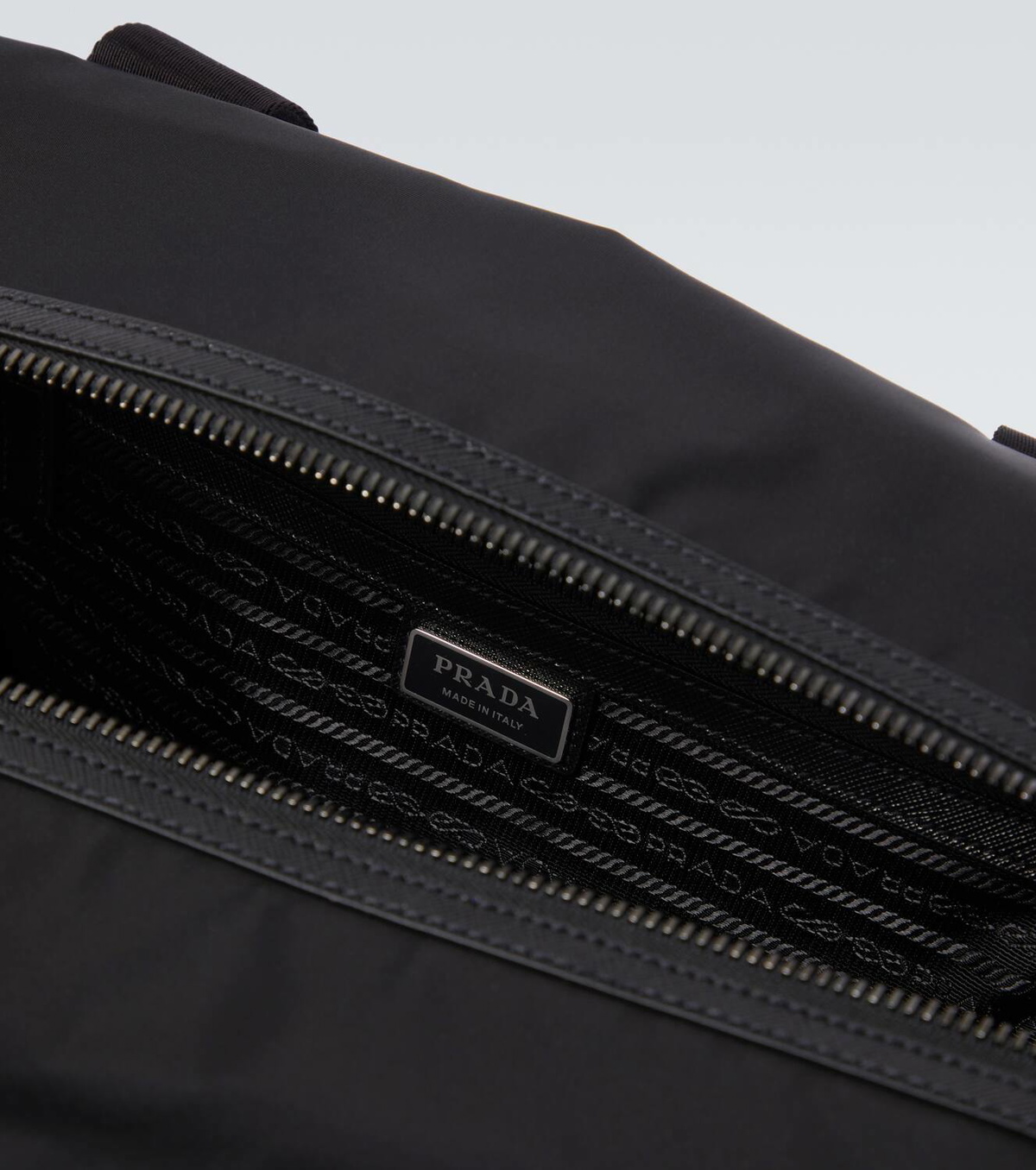 Prada Re-Nylon leather-trimmed duffel bag