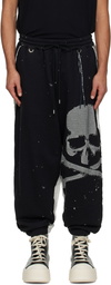 MASTERMIND WORLD Black Cut-Off Sweatpants