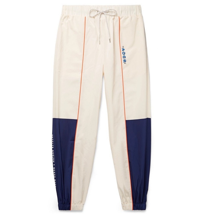 Photo: Maison Kitsuné - ADER error Tapered Logo-Embroidered Piped Shell Track Pants - White